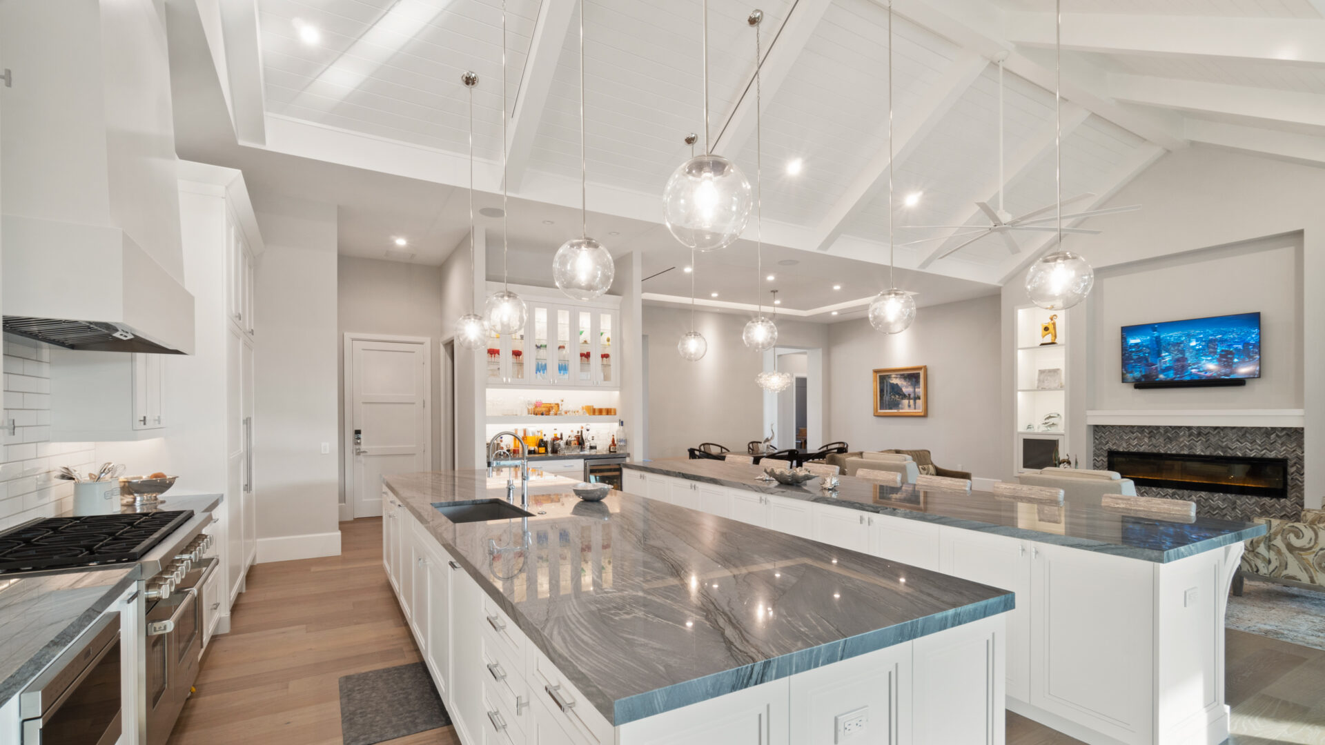 open floor interior showing kitchen leading to living room areas